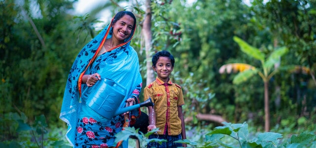 Shukla and her son in Bangladesh