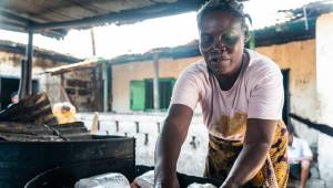 Felicia Fannieh preparing fish