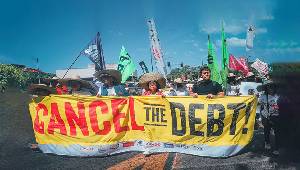 Cancel the debt banner being held up