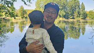 Kang and his 19-month-old son