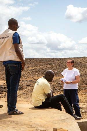 Christine Allen at a Caritas Marsabit underground water tank